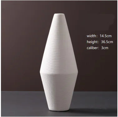 Jarrón minimalista de cerámica blanca