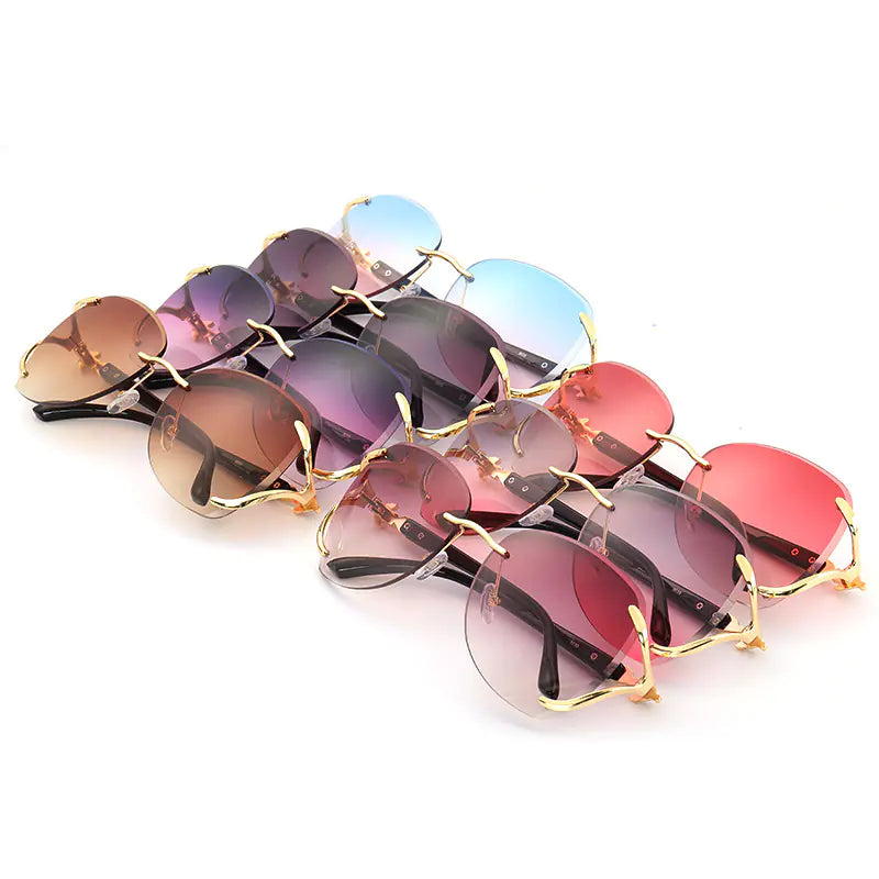 Gafas de sol de moda para mujer con diseño de metal y diamantes