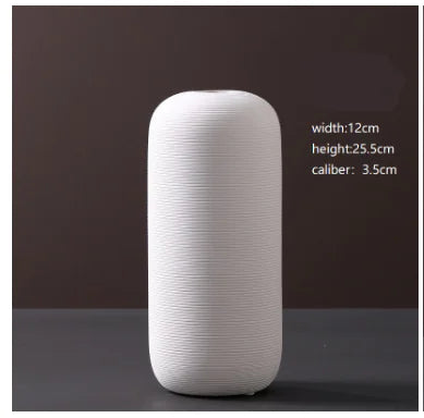 Jarrón minimalista de cerámica blanca