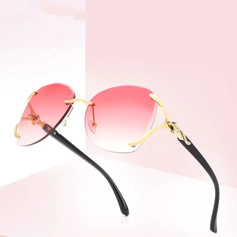 Gafas de sol de moda para mujer con diseño de metal y diamantes