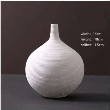 Jarrón minimalista de cerámica blanca