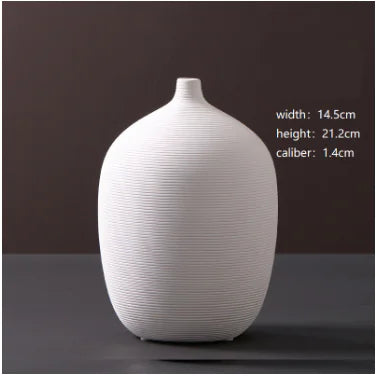 Jarrón minimalista de cerámica blanca