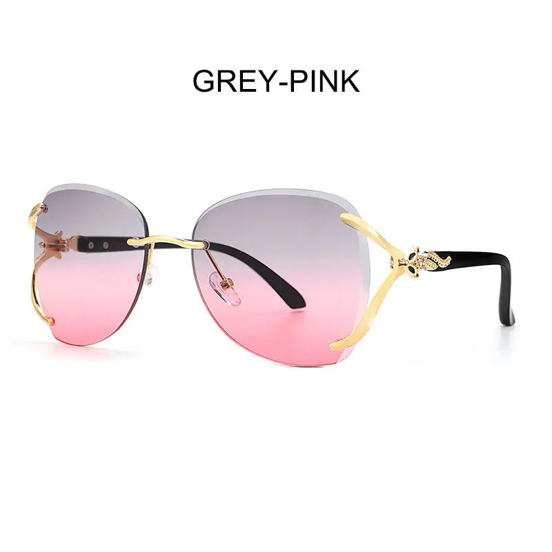 Gafas de sol de moda para mujer con diseño de metal y diamantes