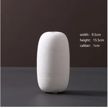 Jarrón minimalista de cerámica blanca