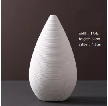 Jarrón minimalista de cerámica blanca