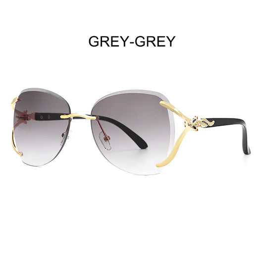 Gafas de sol de moda para mujer con diseño de metal y diamantes