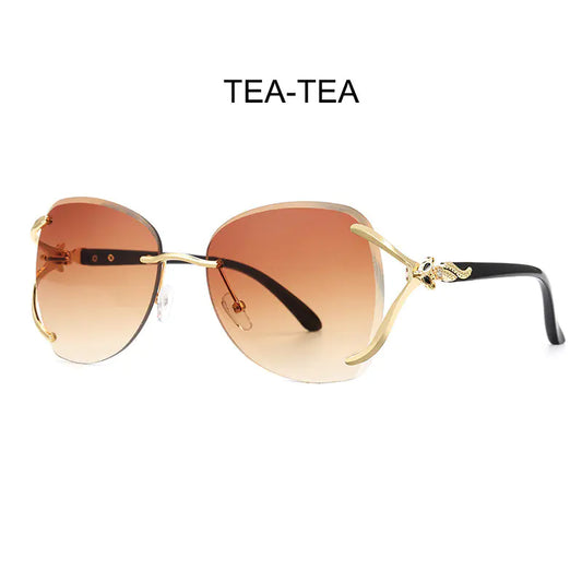 Gafas de sol de moda para mujer con diseño de metal y diamantes