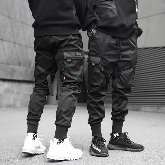 Joggers cargo tipo harén con bolsillos y cintas para hombre